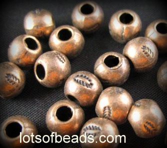 Copper round bead with leaf stamp